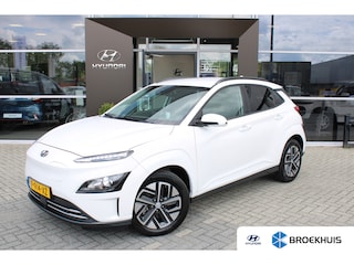 Hyundai Kona EV Fashion 64 kWh | Parelmoer wit | Navigatie | Cruise Control | | Apple Carplay/Android Auto|telefoonintegratie premium | Armsteun voor | Autonomous Emergency Braking