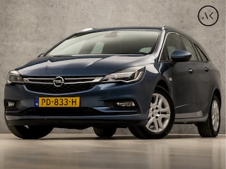 Opel Astra Sports Tourer 1.4 Sport 150Pk (APPLE CARPLAY, GROOT NAVI, CLIMATE, STUUR/STOELVERWARMING, SPORTSTOELEN, CAMERA, TREKHAAK, PARKEERSENSOREN, NIEUWSTAAT)