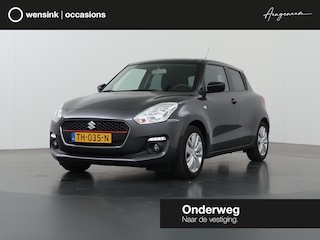 Suzuki Swift 1.0 Select | Trekhaak | Navigatie | Camera | Apple CarPlay/Android Auto | Stoelverwarming | Bleutooth | Verwarmde Buitenspiegels | LED | Dealer Onderhouden |
