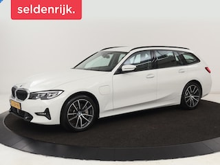 BMW 330e Sport Line | Stoelverwarming | Adaptive cruise | Sportstoelen | Sfeerverlichting | Navigatie | Full LED | Half leder | Live Cockpit | Parkeerhulp | Climate control | PHEV | Plug In