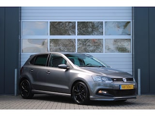 Volkswagen Polo 1.2 TSI R-Line Clima/Cruise/Navi/Bluetooth/PDC/AppleCarplay/AndroidAuto/16"LM/Velgen/RadioCD.AUX.USB/APK:1-3-2026