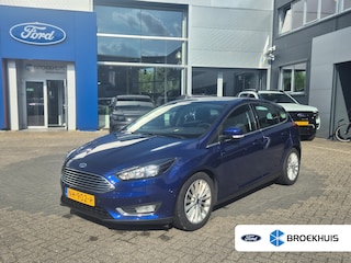 Ford Focus 1.0 Titanium | Trekhaak | Navigatie | Verwarmbare Voorruit | Parkeersensoren Voor & Achter | Audio-navigatie full map | Trekhaak | Trekhaak
