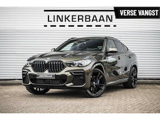 BMW X6 xDrive40i | M Sport | Luchtvering | Panodak | Laser | Trekhaak | 22 inch | NL Auto |