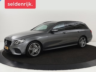 Mercedes-Benz E-klasse 220d Business Solution AMG | Stoelverwarming | Trekhaak | Camera | Carplay | Widescreen | Half leder | Navigatie | Full LED
