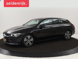 Mercedes-Benz CLA 180 Business Solution | Stoelverwarming | Half leder | Camera | Navigatie | Widescreen | Full LED | Park Assist | Climate control