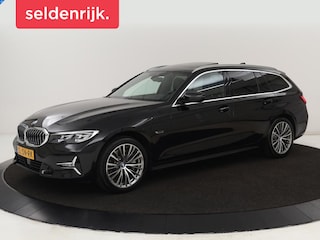 BMW 330e xDrive Luxury Line | Panoramadak | Adaptive cruise | Stoelverwarming | Leder | Sportstoelen | Trekhaak | Sfeerverlichting | Live Cockpit | Carplay | Memory | PHEV | Plug In