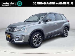Suzuki Vitara 1.0 Boosterjet Stijl Elektronisch schuif- kanteldak | All seasonbanden | Parkeersensoren voor- en achter | Navigatiesysteem | Afneembare trekhaak | Adaptieve Cruise Control | Climate Control | 36 maanden GARANTIE