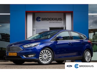 Ford Focus 1.0 Titanium | Trekhaak | Navigatie | Verwarmbare Voorruit | Parkeersensoren Voor & Achter | Audio-navigatie full map | Trekhaak | Trekhaak