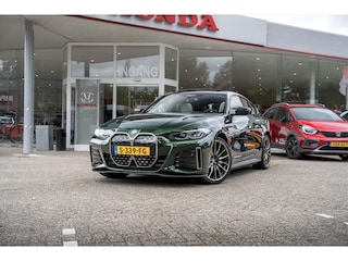 BMW i4 (g26) M50 High Executive 84 kWH | Harman / Kardon | Panodak | Elektrische trekhaak | Laserlight | Adaptieve cruise | 360 camera | M-Perfomance parts