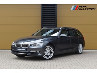 BMW 3-serie Touring 320i High Executive * Sportstoelen * Navigatie Proffesional * Sportstuurwiel *