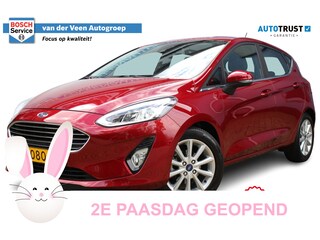 Ford Fiesta 1.0 EcoBoost Titanium | Incl. 12 maanden Garantie | Parkeersensoren | Stoel/Stuur verwarming | Lane assist | Cruise control | Climate Control | 16 Inch LMV | Radio | Navigatiesysteem | Apple CarPlay/Android Auto | Origineel NL auto | NAP |