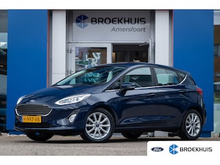 Ford Fiesta 1.0 EcoBoost Titanium | Trekhaak | Apple Carplay/Android Auto | Navigatie | Cruise control | LED | Lichtmetalen velgen 16" | Airco (automatisch) | Apple Carplay/Android Auto|telefoonintegratie premium | Cruise control