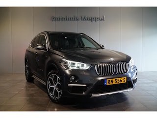 BMW X1 sDrive20i X Line | Apple carplay / Android auto | PDC | Head-Up Display | Panoramadak | LED | Trekhaak |
