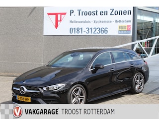 Mercedes-Benz CLA Shooting Brake 180 AMG Orig. Ned./Automaat/Apple carplay/Sfeerverlichting/Airco/Navigatie/Cruise control/Wide digital screen/Elektrische achterklep/Stoelverwarming/Keyless entry+start/Spiegels inklapbaar/Achteruitrijcamera/Lichtmetalen velgen