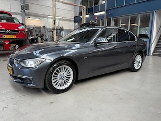 BMW 320i 184pk Aut High Executive | Cognac leder | Stoelverwarming | Navigatie | Climate control | Bluetooth | NAP | Rijklaar prijs!