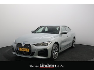 BMW i4 eDrive40 84 kWh M-Sportpakket SOH 97,4% | Brooklyn Grau | Live Cockpit Plus | Leer