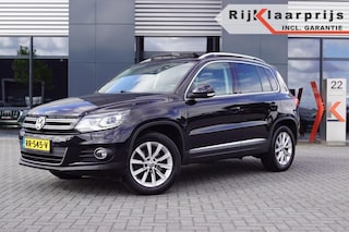Volkswagen Tiguan 14 TSI Sport &amp; Style /Panodak /  Leer / Navi / Trekhaak afnb. / Xenon