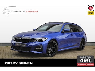 BMW 3-serie Touring 320i M sport // Portimao Blue | BTW auto | Panoramadak | Trekhaak | Sfeerverlichting | CarPlay & Android Auto