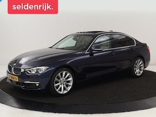 BMW 330e | Schuifdak | Head-Up | Stuurverwarming | Adaptive cruise | Camera | Memory | Leder | Sportstoelen | Navigatie | Stoelverwarming | Park Assist | Keyless
