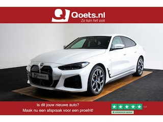 BMW i4 eDrive40 High Executive 84 kWh M Sport - Trekhaak - Parking/Driving Assistant - Comfort Access - Harman Kardon - Elektrisch verwarmde stoelen - Stuurwielrand verwarmd - Getinte Ruiten - Adaptief M Onderstel -