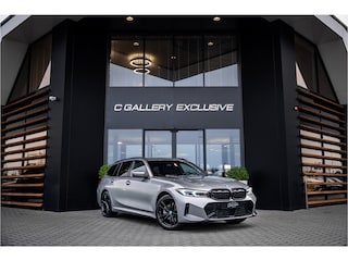BMW 3-serie Touring 330e xDrive - Panorama | H&K | Memory | 360 Camera | HUD