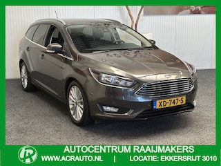 Ford Focus Wagon 1.0 Titanium NAVIGATIE CRUISE CONTROL STOEL EN STUURVERWARMING APPLE CARPLAY/ANDROID RIJSTROOKSENSOREN DODEHOEKSENSOREN KEYLESS GO TREKHAAK ACHTERUITRIJCAMERA ZEER MOOI !! 3010