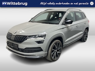 Skoda Karoq 1.5 TSI ACT Sportline Business / AUTOMAAT/ CAMERA/ PARK. SENSOREN/ STOELVERWARM./ CRUISE/ KEYLESS/ CRYSTAL LIGHTING/ SMARTLINK/ CLIMA/ DAB/ 19" LMV