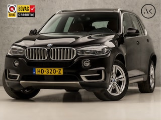 BMW X5 xDrive40e High Executive 313Pk Automaat (PANORAMADAK, GROOT NAVI, HEAD-UP DISPLAY, MEMORY SEATS, ZWART HEMEL, HARMAN/KARDON, ADAPTIVE CRUISE, CAMERA, SFEERVERLICHTING, NIEUWSTAAT)