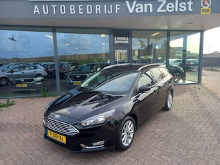 Ford Focus Wagon 1.5 Titanium 150 PK, Airco(automatisch), Multimedia systeem, App connect, Cruise control, Navigatie, Parkeerhulp, Parkeersensoren, Stuurverwarming, Stoelverwarming , Voorruit verwarmd, Zeer nette auto inclusief Bovag garantie