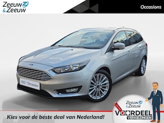 Ford Focus Wagon 1.0 Titanium Edition | Parkeersensoren | Navigatie | Voorruitverarming | Climate control | All-Season banden | 12 maanden garantie! |