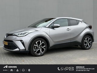 Toyota C-HR 1.8 Hybrid First Edition / Afneembare Trekhaak (Trekgewicht 725kg) / Achteruitrijcamera / Stuur- en Stoelverwarming / Voorruit Verwarming / Navigatie via Apple Carplay & Android Auto / Cruise- en Climate Control / Keyless Entry & Start /