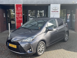 Toyota Yaris 1.5 Hybrid DYNAMIC APPLE/ANDROID KEYLESS 15'' LM-VELGEN CLIMA CRUISE CAMERA BLUETOOTH NL-AUTO 1E-EIG