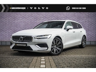 Volvo V60 2.0 T8 Twin Engine AWD R-Design | Trekhaak | Stoel- en stuurwielverwarming | Lederen bekleding | Achterbankverwarming | Getint glas | Alarm |