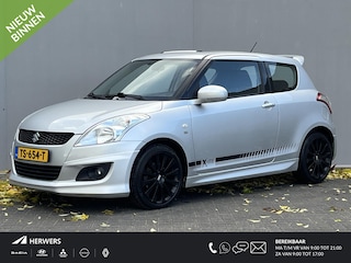 Suzuki Swift 1.2 Exclusive X-ITE / Trekhaak (Trekgewicht 1.000kg) / Elektrisch Glazen Schuif- en Kanteldak / Keyless Entry & Start / Verwarmde Voorstoelen / Cruise- en Climate Control /