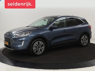 Ford Kuga 2.5 PHEV Titanium X | Trekhaak | Stoelverwarming | Camera | Carplay | Half leder | Achterbankverwarming | Navigatie | Full LED | Climate control | Parkeerhulp | Keyless | B&O Sound | Plug In