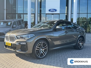 BMW X6 xDrive40i High Executive HUD | H&K | Pano | Luchtvering | 360 Camera | Stuurverwarming | Memory seats | Trekhaak | Adapt. Cruise Control + Zelfsturende functie