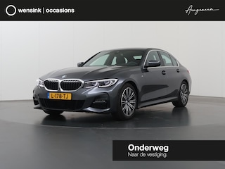 BMW 320i Business Edition M-Sport Plus | Trekhaak | Leder |  Parkeercamera | Head-Up | Stoelverwarming | Keyless Go |