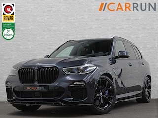 BMW X5 45e M-Stoelen | M-Performance | 360 Camera | ACC | Indiv. Leder | Harman-Kardon | Laser-LED | Keyless-Entry | Stoelventilatie | Head-Up | Memory | 21'' | Sfeerverlichting | Trekhaak | Luchtvering | Rij-Assistent Pro | Carplay | Black-Optic | Draadloos Laden.