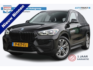 BMW X1 xDrive25e Business Edition Plus | Incl. 12 maanden garantie | Head-up display | Parkeersensoren | Verwarmde voorstoelen | Schuif/kantel dak | Climate control | Lichtmetalen velgen | Elektrische kofferklep | Cruise control | Bluetooth