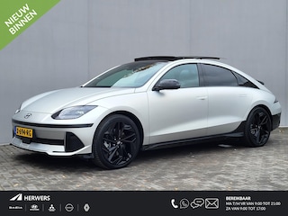 Hyundai Ioniq 6 First Edition AWD 77.4 kWh Automaat / 100% SOH / Origineel NL Auto / tot 04-2009 Fabrieksgarantie / Allseason banden / Schuifkanteldak / 360° camera / Navigatie / Headup Display / Android Auto / Apple Carplay / BOSE audio / Stuur-, voorstoel- en achterbankverwarming /