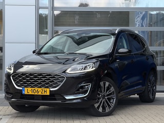 Ford Kuga 2.5 PHEV Vignale | Camera | Memory stoel | Winter Pack | 20 inch | Apple Carplay | Draadloze telefoonlader