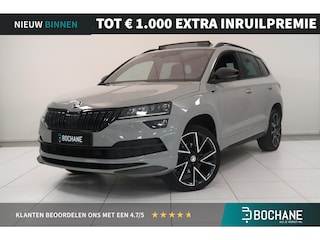 Skoda Karoq 1.5 TSI ACT Sportline Business | Adaptieve cruisecontrol | Camera | Panoramadak | Trekhaak | CANTON audio | Elektr achterklep | Stuur en stoel verwarming |