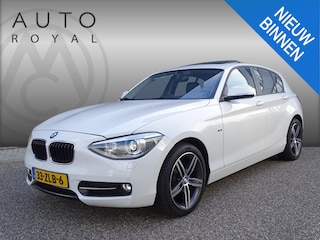 BMW 116i Upgrade Edition AUTOMAAT | PANORAMDAK | CRUISE CONTROL | NAVIGATIE | LEDER SPORT INTERIEUR | XENON - LED | PARKEERSENSOREN |AIRCO/ECC