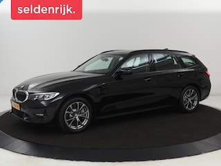 BMW 330e Sport Line | Stoelverwarming | Carplay | Sportstoelen | Half leder | Camera | Navigatie | Live Cockpit | DAB | Full LED | Park Assist | Navigatie | Climate control | PHEV | Plug In
