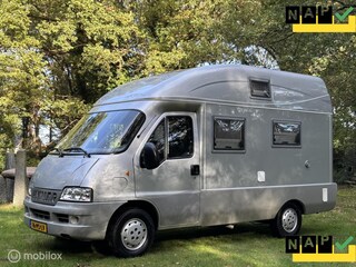 Hymer EXSIS Buscamper Compact 5,45 m Fiat 2.3 110 Pk H5 | Airco | Cruise | Camera | Orig. NL | 4 Zitpl/2 slaappl.| Hefbed | Lift-fietsendrager | Zeer nette staat