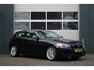 BMW 116i High Executive M-Sport Clima/Cruise/Stoelverwarming/Xenon/PDC/LederSportstoelen/Navi/Bluetooth/RadioAUX.USB/17"LM