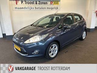 Ford Fiesta 1.25 Titanium | Cruise control | Climate control | Verwarmde voorruit | Parkeersensoren | Elek. inklapbare spiegels