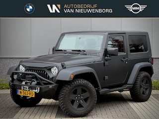 Jeep Wrangler 3.8i Sport Automaat | XRC Bumpers | Mopar Zijschermen | Rollcage | LED | Afneembaar Dak | Custom Uitlaat | Apple Carplay | 4-Zits | Offroadbanden | Hardtop