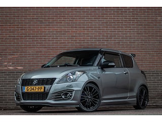Suzuki Swift 1.6 Sport, Stoelverwarming, Xenon, Climate control, Subfwoofer, Bluetooth, Cruise control.