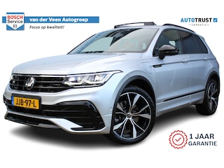 Volkswagen Tiguan 1.4 TSI eHybrid R-Line Business | Incl. 12 maanden Garantie | Panorama dak | Stoel/stuurverwarming | 360* Camera | Elektrisch verstelbare stoelen met memory | Achterbank verwarmd | Keyless enry/start | Adaptieve cruise | Lane assist | IQ.Lights | Dodehoekdetectie | Elektrische kofferbakklep | Draadloze telefoonlader | Sfeerverlichting | Apple CarPlay/Android auto | Climate controle | Navigatie | 20 Inch LMV |